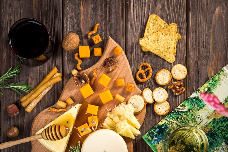 Top View of Gourmet Snacks on Wooden Background